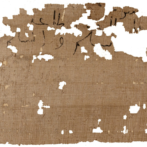 Fragment de papyrus contenant des traces de quelques mots arabes.