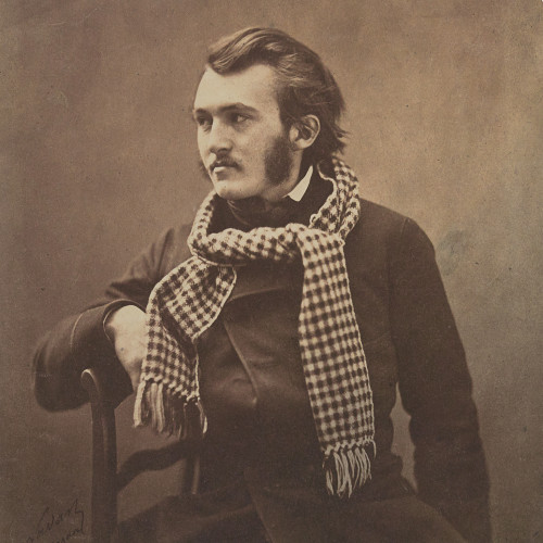 Gustave Doré avec une écharpe à carreaux