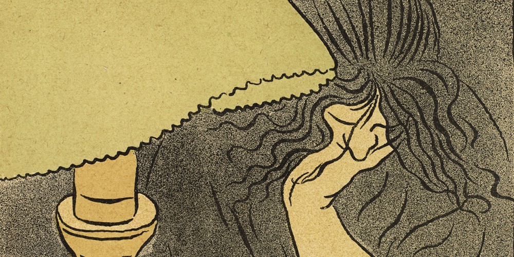 Femme lisant près d'une lampe