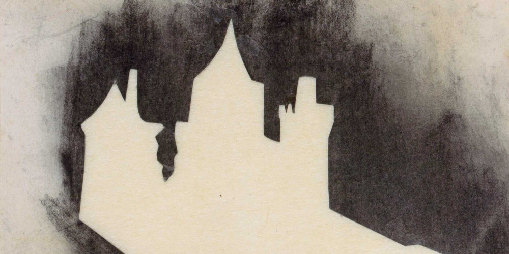 Silhouette d’un château à trois tours