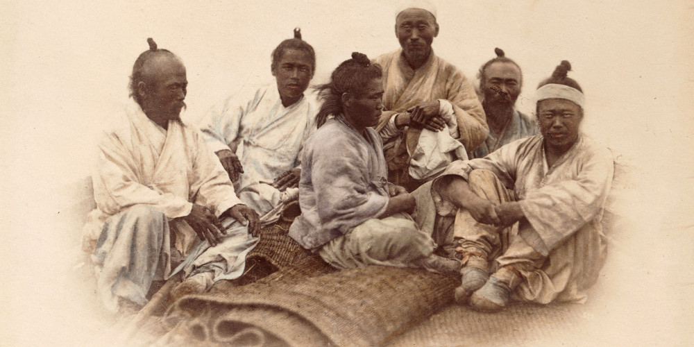 Corée : groupe de six personnages assis, en 1871