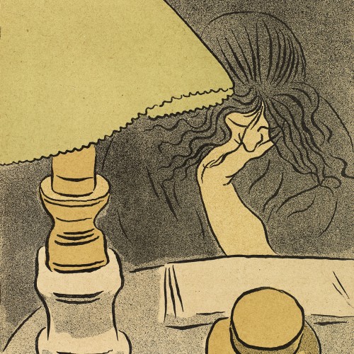 Femme lisant près d'une lampe